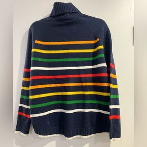 Jcrew size Small, women’s sweater, navy blue with multi colored stripes.